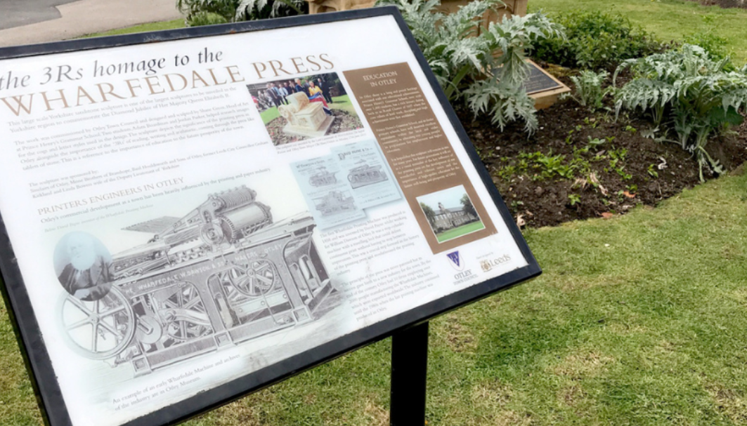Image of the sign showing the Wharfedale Press statue in Otley 